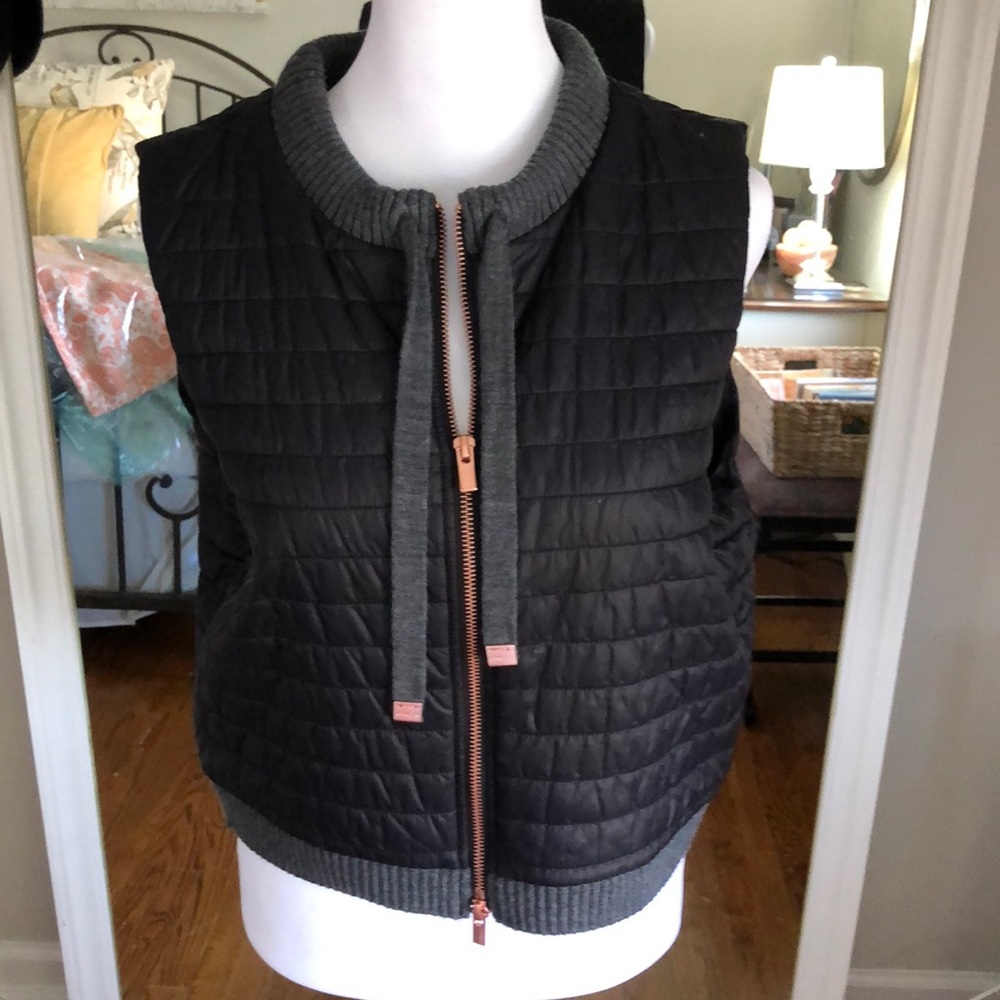 So cute but too short for my torso. knit details with rose gold hardware.